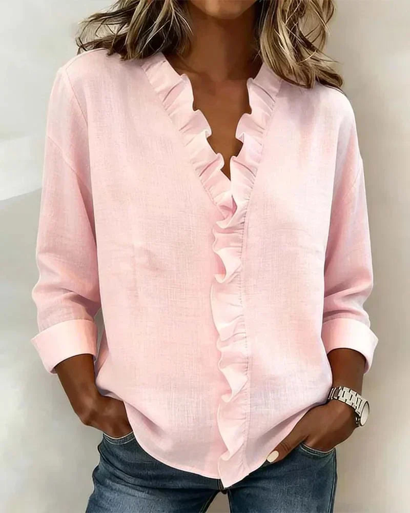 Anora |  Blusa con volantes y cuello en V