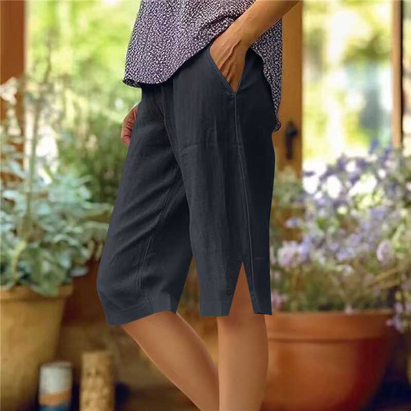 Pantalón capri de mujer liso con bolsillos laterales