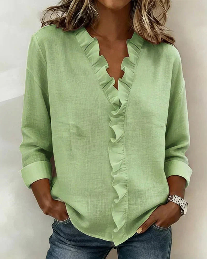 Anora |  Blusa con volantes y cuello en V