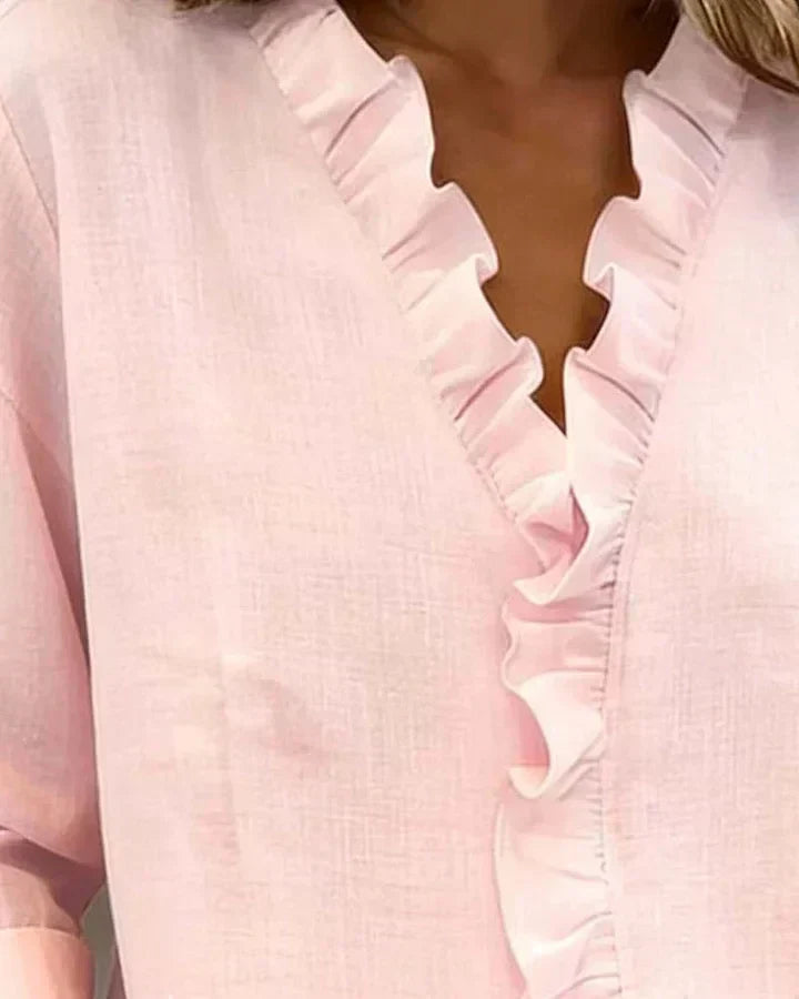 Anora |  Blusa con volantes y cuello en V