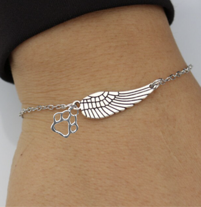 Pulsera Memorial de Plata con Ala de Ángel y Huella de Patita | Hecho a Mano