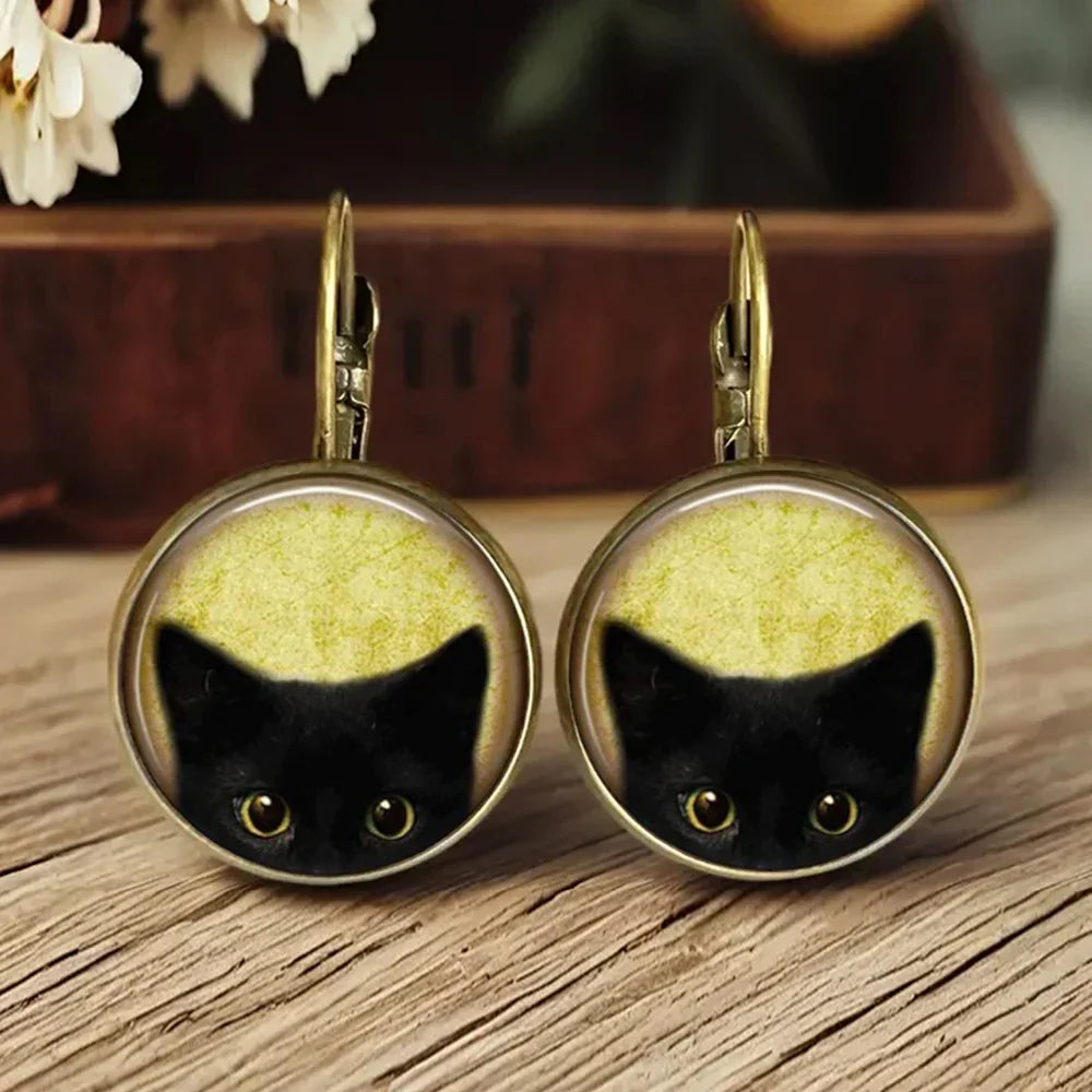 Aretes de vidrio en forma de dome con animales caprichosos
