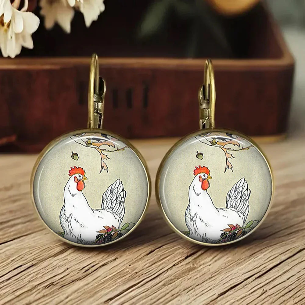 Aretes de vidrio en forma de dome con animales caprichosos
