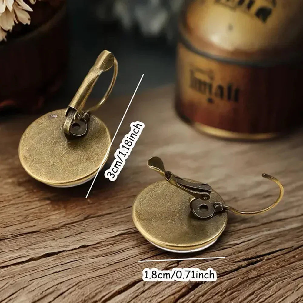 Aretes de vidrio en forma de dome con animales caprichosos