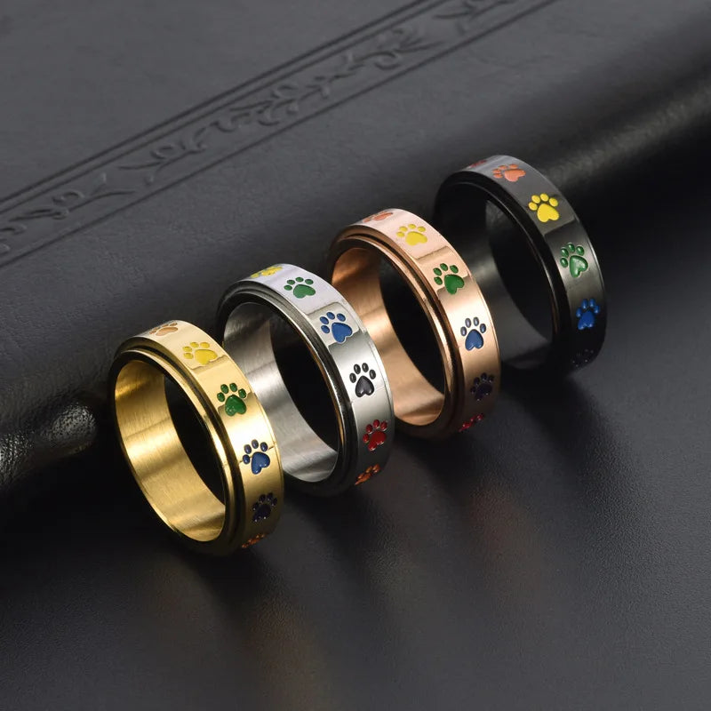 Anillo Giratorio Reductor de Estrés – Acero Inoxidable con Huellas Arcoíris