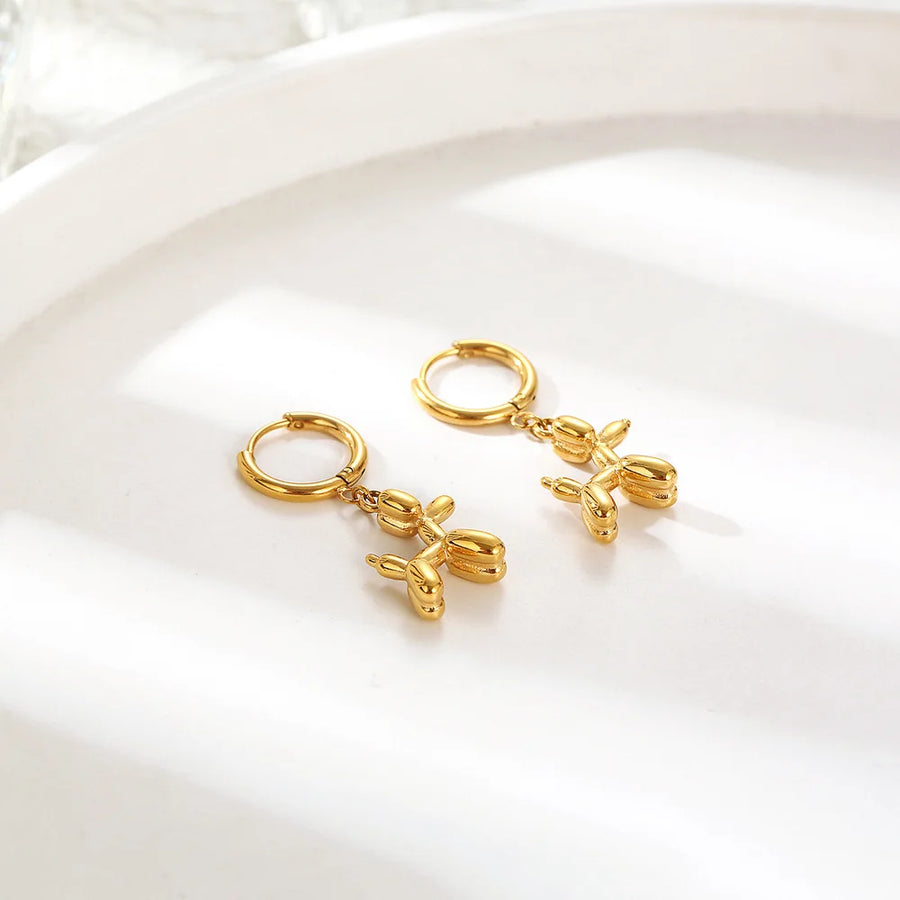 Pendientes Huggie de Oro con Encanto de Perro Globo Mini