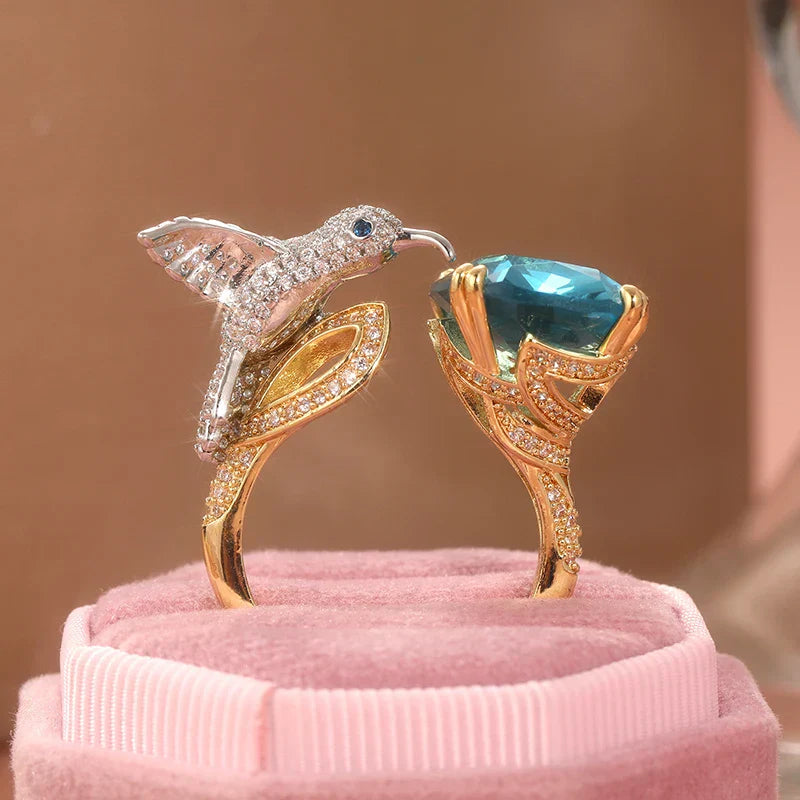 Anillo Ajustable de Colibrí Color Aguamarina – Baño de Oro de 14K
