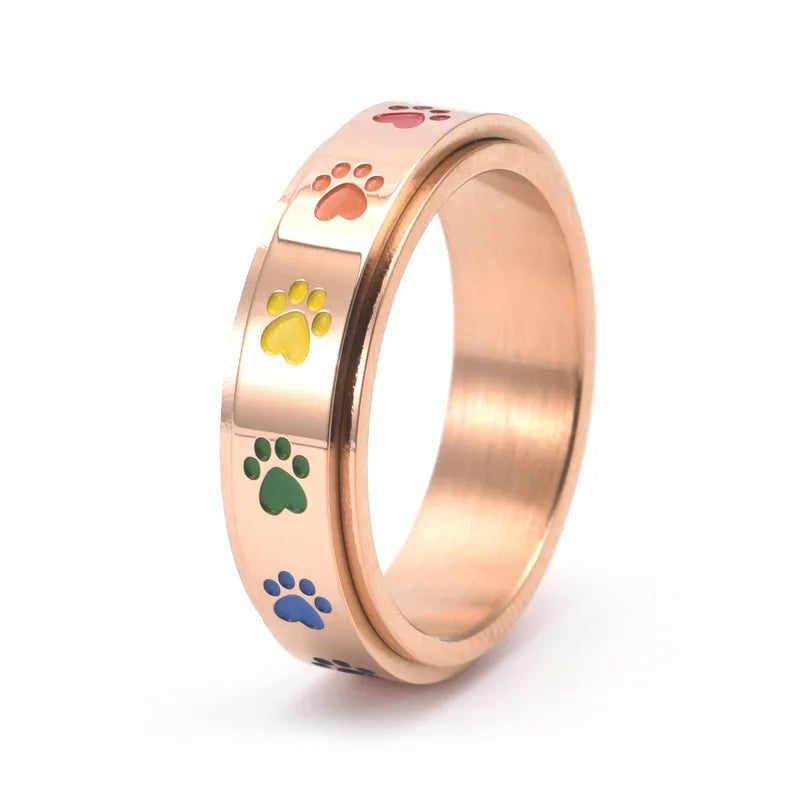 Anillo Giratorio Reductor de Estrés – Acero Inoxidable con Huellas Arcoíris