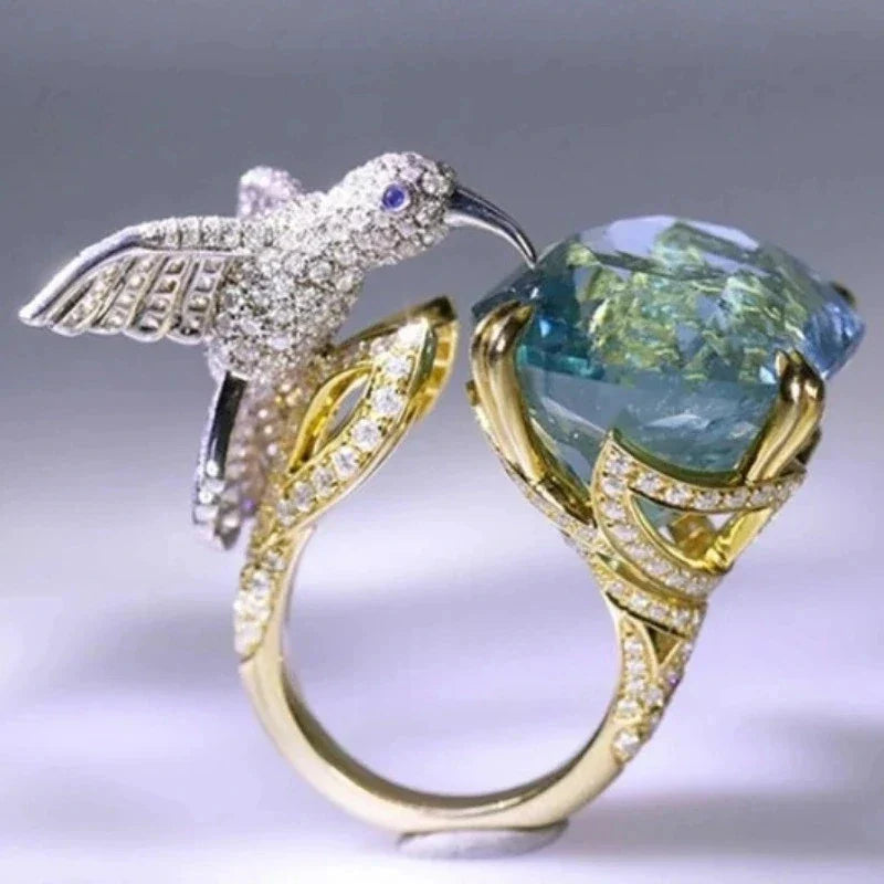 Anillo Ajustable de Colibrí Color Aguamarina – Baño de Oro de 14K