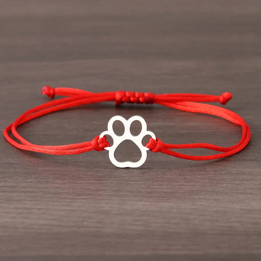 Pulsera de Cuerda con Huella de Patita – Diseño Ajustable en Negro y Rojo