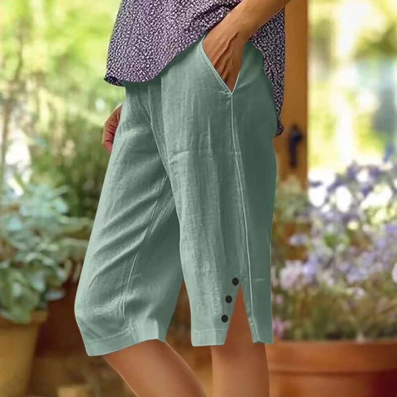 Pantalón capri de mujer liso con bolsillos laterales
