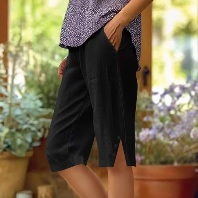 Pantalón capri de mujer liso con bolsillos laterales